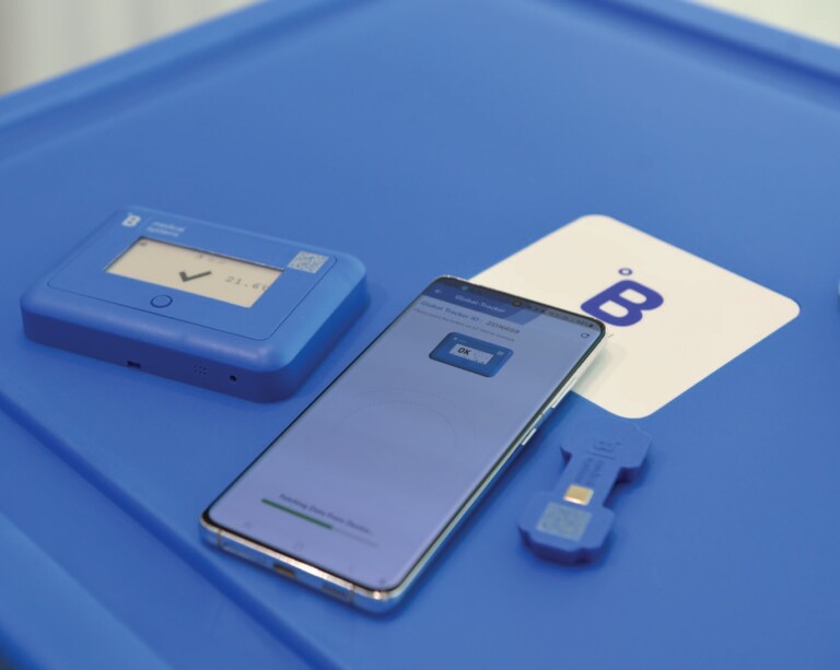 GT Mini device and mobile app on a medical-grade transport box.